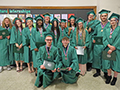  Big Picture Class of 2023 graduates pose for a picture in the school's hallway.